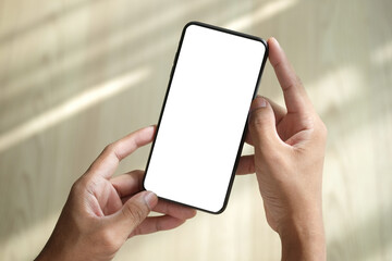 Close up view man hands holding smart phone with blank screen for advertise text, information content.