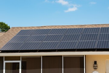 Fototapeta premium Solar panels on house rooftop