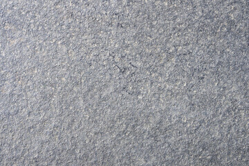 Textured rock in tones of gray color, as a natural  background
