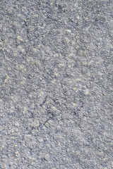 Textured rock in tones of gray color, as a natural  background

