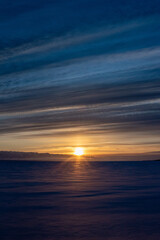 Obraz premium Sunrise over frozen Lake Huron