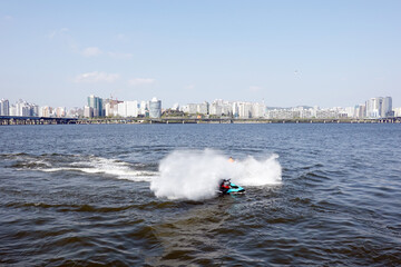 Fototapeta premium Jet ski on the Han River, Seoul landscape