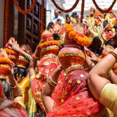 Women with Kalash on head during Jagannath Temple Mangal Kalash Yatra, Indian Hindu devotees carry...