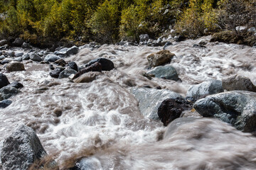 Powerful flow of mountain river Terskol Caucasus