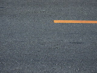 texture of asphalt road with yellow line