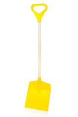 Yellow plastic shovel isolated on a white background, close-up. Children's toys for playing in the...