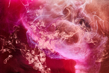 Multicolor pink smoke on black ink background, colorful fog, abstract swirling touch ocean sea,...