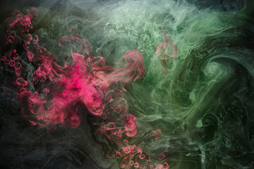 Green pink smoke on black ink background, colorful fog, abstract swirling touch ocean sea, acrylic...