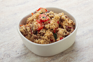 Arabic cous cous with meat and tomato