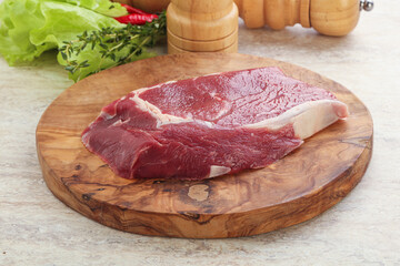 Raw rib-eye beef steak black angus