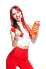 A beautiful, athletic, slim, smiling and cheerful woman in a white top and red sweatpants holds a red dumbbell and a bottle of water. Lifestyle concept with sports and gym, healthy lifestyle. Isolated