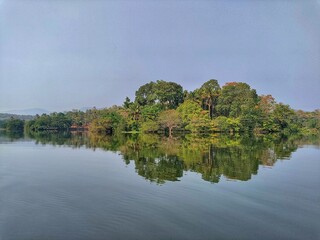 Bank’s of river Periyar at bhoothathankettu, kerala. Reflection of nature on the surface of river.