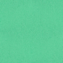 Kraft recycled paper texture in green tones. Seamless background. 