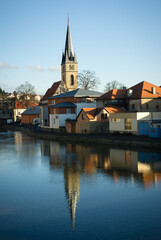 Fototapeta na wymiar Ledec nad Sazavou church reflecting in river