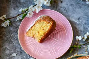 Homemade  Italian style  Easter  bread cake, spring blossom  and  hand colored eggs. Homemade pastry.  Easter holiday baking and decorarion