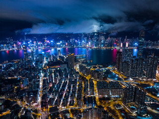 Top view of Hong Kong city at night - obrazy, fototapety, plakaty