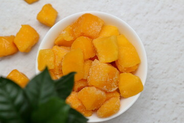 Frozen mango slices for dessert