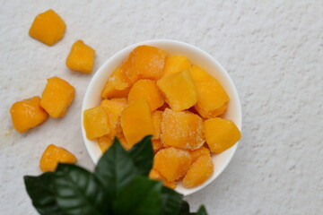 Frozen mango slices for dessert