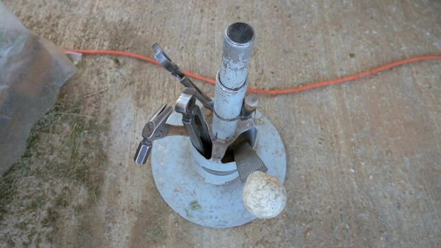 Close-Up Shot Of Person Hammering Nail In Horseshoe - Negev, Israel