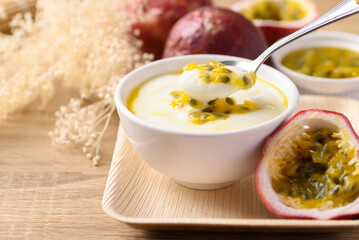 Yogurt with passion fruit in bowl, Healthy eating