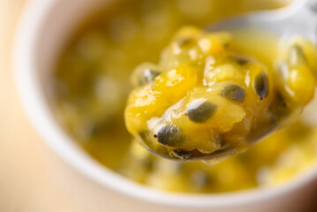 Passion fruit juice in spoon, Healthy eating, Close up