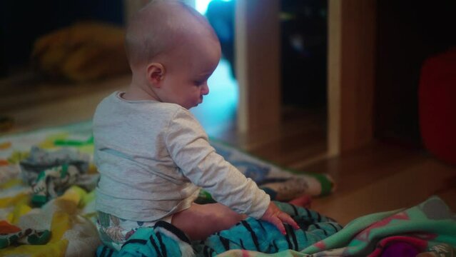 Playful Toddler On Blanket In Bedroom At Home - Fairbanks, Alaska