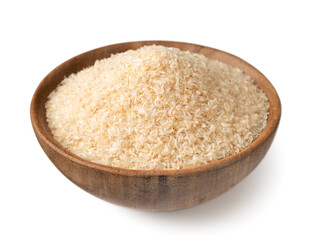 Psyllium husks in the wooden bowl, isolated on white background.