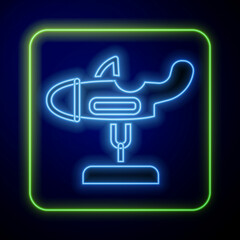 Glowing neon Swing plane on the playground icon isolated on blue background. Childrens carousel with plane. Amusement icon. Vector