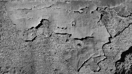 gray background. in the photo, an old gray concrete wall in close-up.