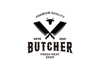 Vintage butcher shop logo with meat knives and bull head
