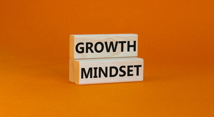 Growth mindset symbol. Wooden blocks with concept words Growth mindset on beautiful orange background. Business growth mindset concept. Copy space. - obrazy, fototapety, plakaty