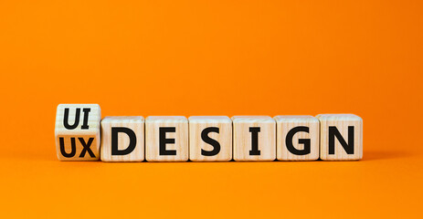 UX user experience design or UI user interface design symbol. Turned wooden cubes and changed words...