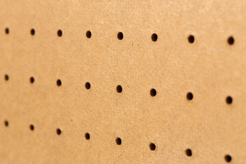 Peg board texture close up