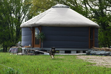 Image of a modern yurt, alternate and different way of living closer to nature.