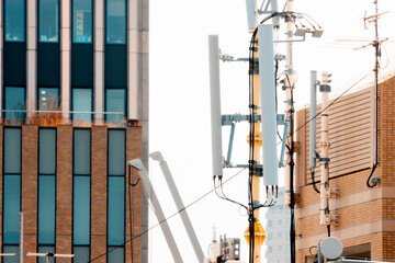 5G communication tower with bunch of antennae for New Radio (NR) Service install on the top of building