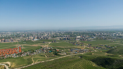 Fototapeta na wymiar Aerial view of Bishkek city from the mountains