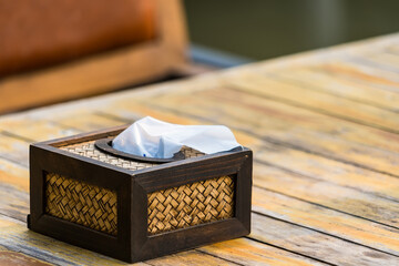 Tissues on the table in a restaurant.