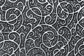 Metallic silver background with textures and wavy pattern. Gray backdrop of shiny textile and...