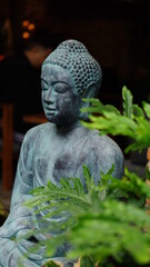 Buddha in a small garden.