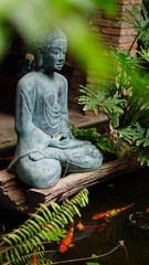 Buddha in a small garden.