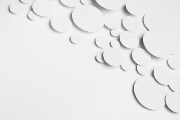 Abstract flow of flying white paper ovals different size in shine light with soft shadows as energy pattern, top view, border, copy space. Contemporary softness airy activity abstract background.
