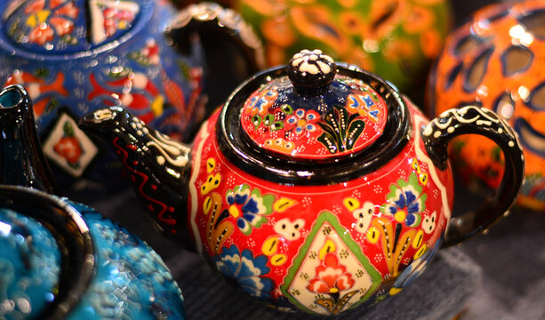 beautiful teapots with the colors of the rainbow