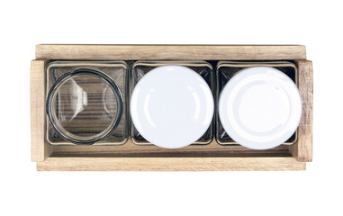 glass bottle on wooden tray isolated on white background