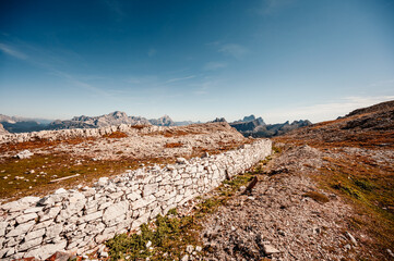 Mountain climber on a steep and exposed Via Ferrata Col dei Bos near passo falzarego. Majestic...