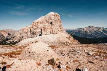 Mountain climber on a steep and exposed Via Ferrata Col dei Bos near passo falzarego. Majestic...