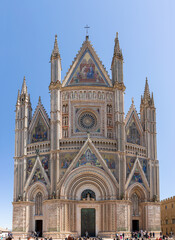 Orvieto, Umbria Italy: April 18, 2022: Famous cathedral Santa Maria Assunta made of mosaic scenes...