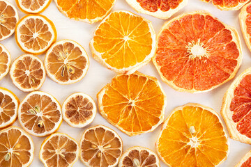 Dried slices of citrus fruits. Lemons, oranges, grapefruits. Colorful background