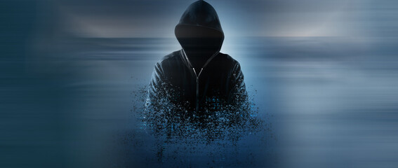 Fototapeta hacker in the hood on a blue background obraz