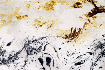 Fabric texture black with yellow natural silk marble print, tie-dye technique.