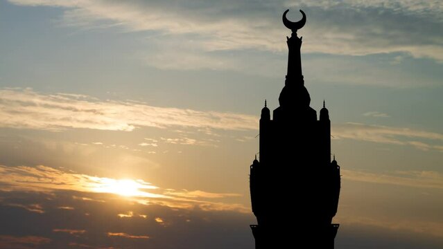 Mecca Clock Tower Silhouette: Time Lapse at Sunrise with Red Light, Saudi Arabia